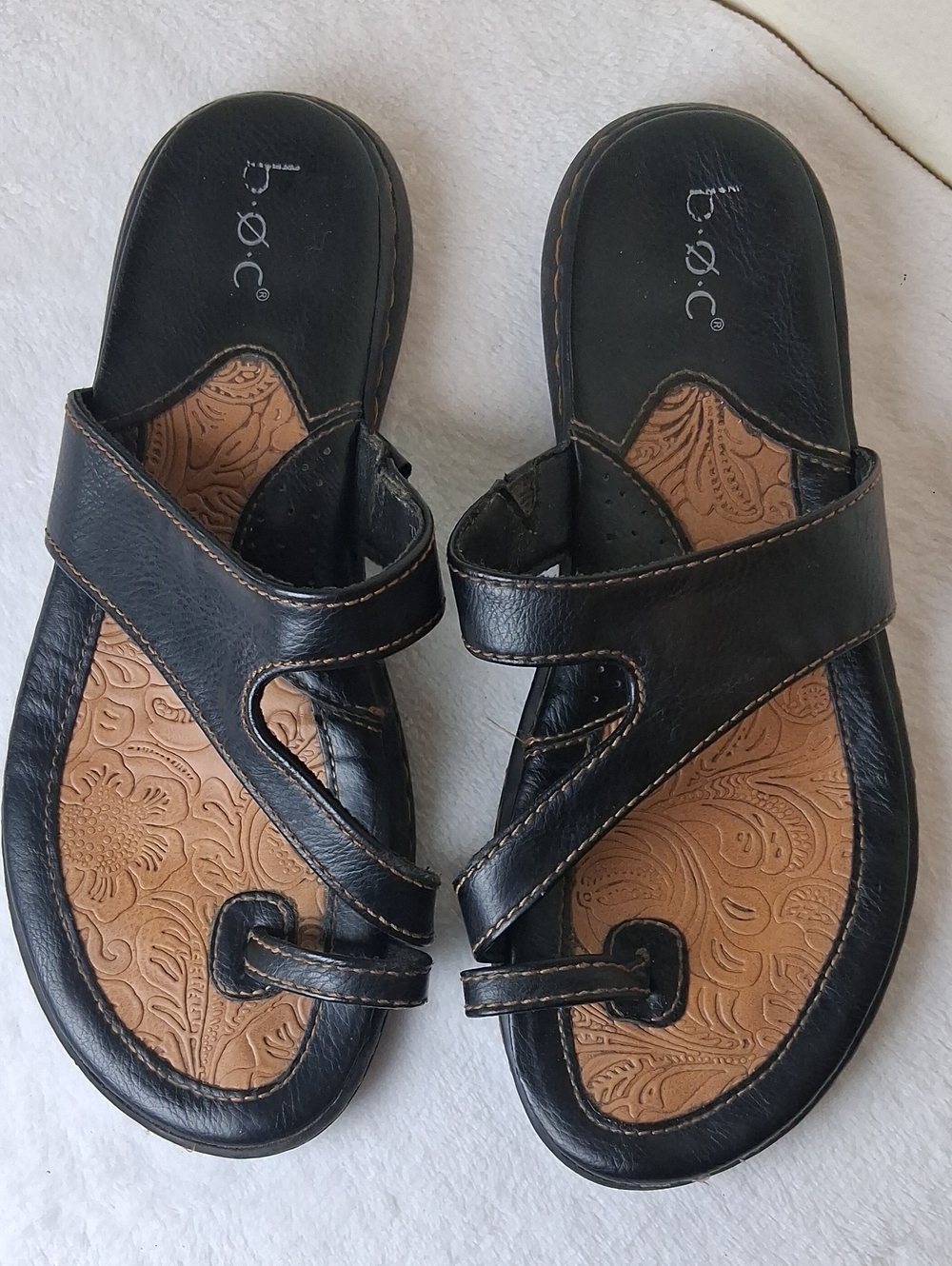 b.o.c. Black Slide Sandals with Tan Embossed Footbed